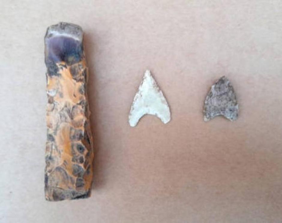 Flint tools and arrowheads found at the site.