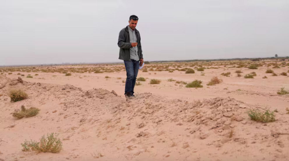 Researcher Dr Jaafar al Jotheri explores the site of the Battle of Al Qadisiyah. AP