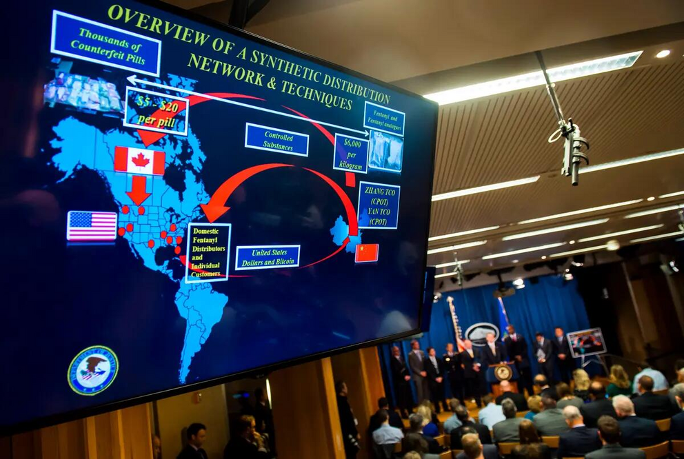 An overview of global illicit drug pathways, shown during a press conference at the Department of Justice in Washington on Oct. 17, 2017.