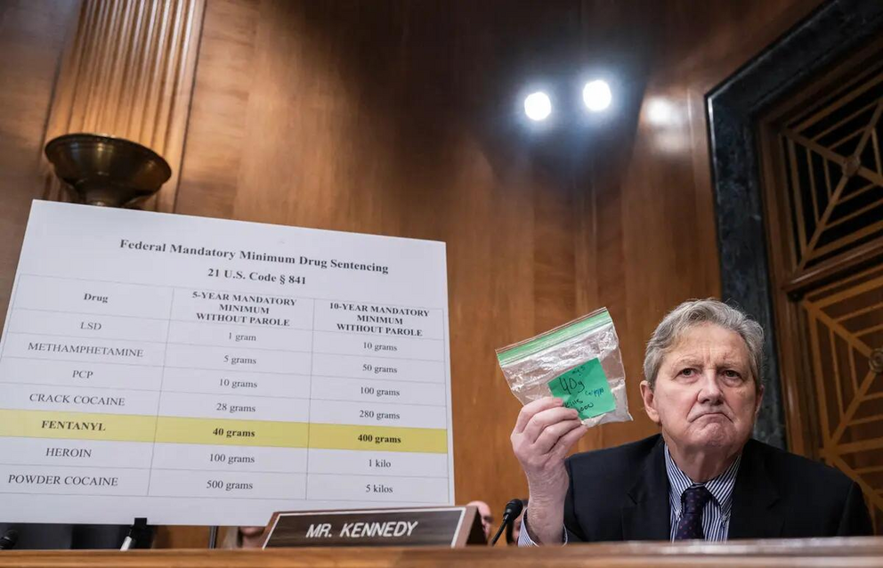 Sen. John Kennedy (R-La.) holds up a bag representing fentanyl during a hearing in Washington on Jan. 11, 2024. The hearing examined legislative solutions to stop the flow of fentanyl into and throughout the United States.